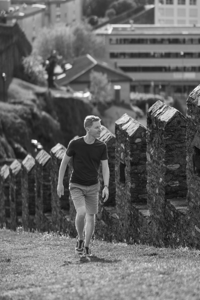 A man is walking at Castel Grande in Bellinzona